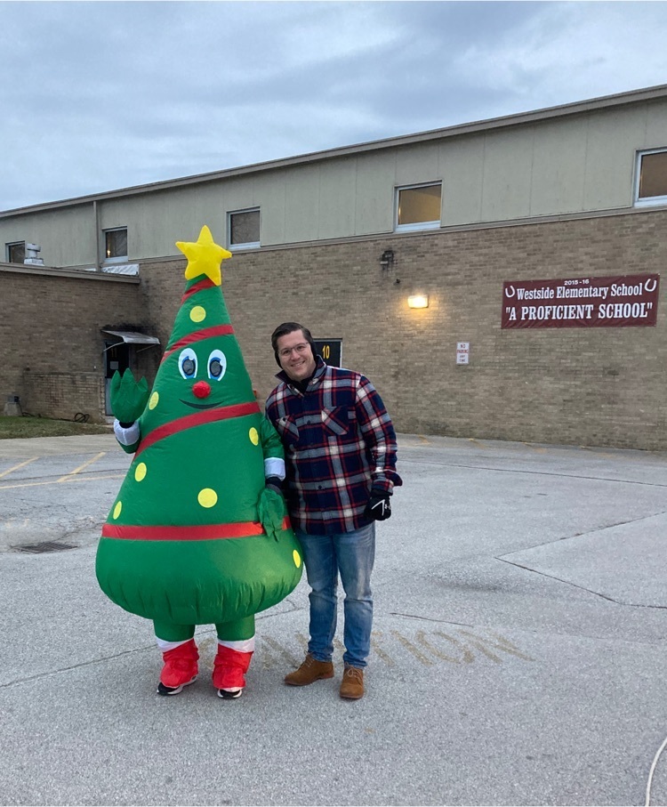 Mr. Hoskins and a friendly Christmas tree  