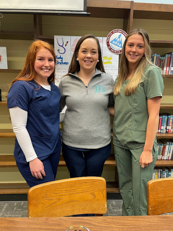 Allied Health L-R Kenley Tumey, Mrs. Franzen, and Lily Winkle