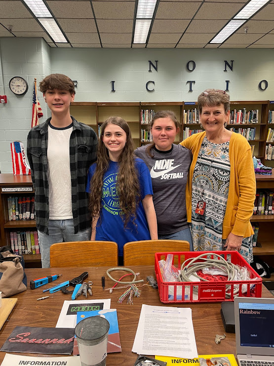 Information Technology and Coding L-R Caleb Irvin, Taylor Bailey, Savanna White, and Mrs. Burns